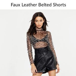 Boohoo Faux leather black belted shorts